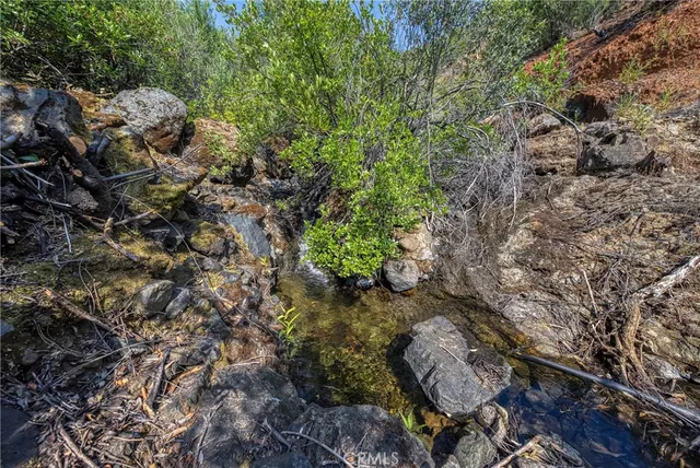 a view of mountain view with mountains in the background