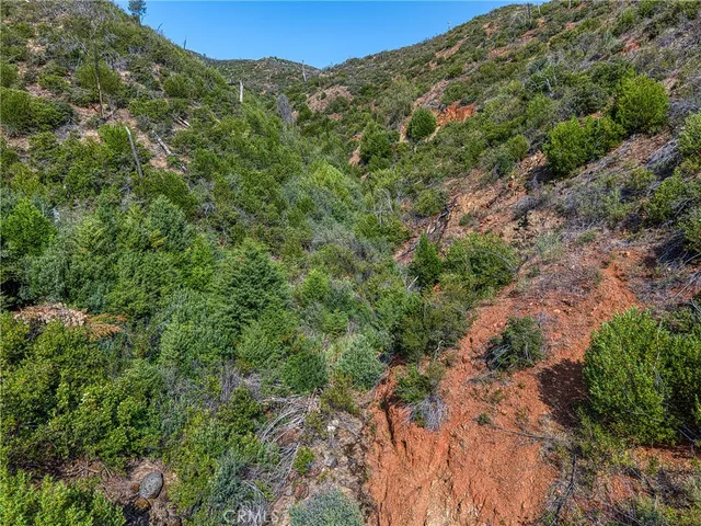a view of a city with mountains in the background