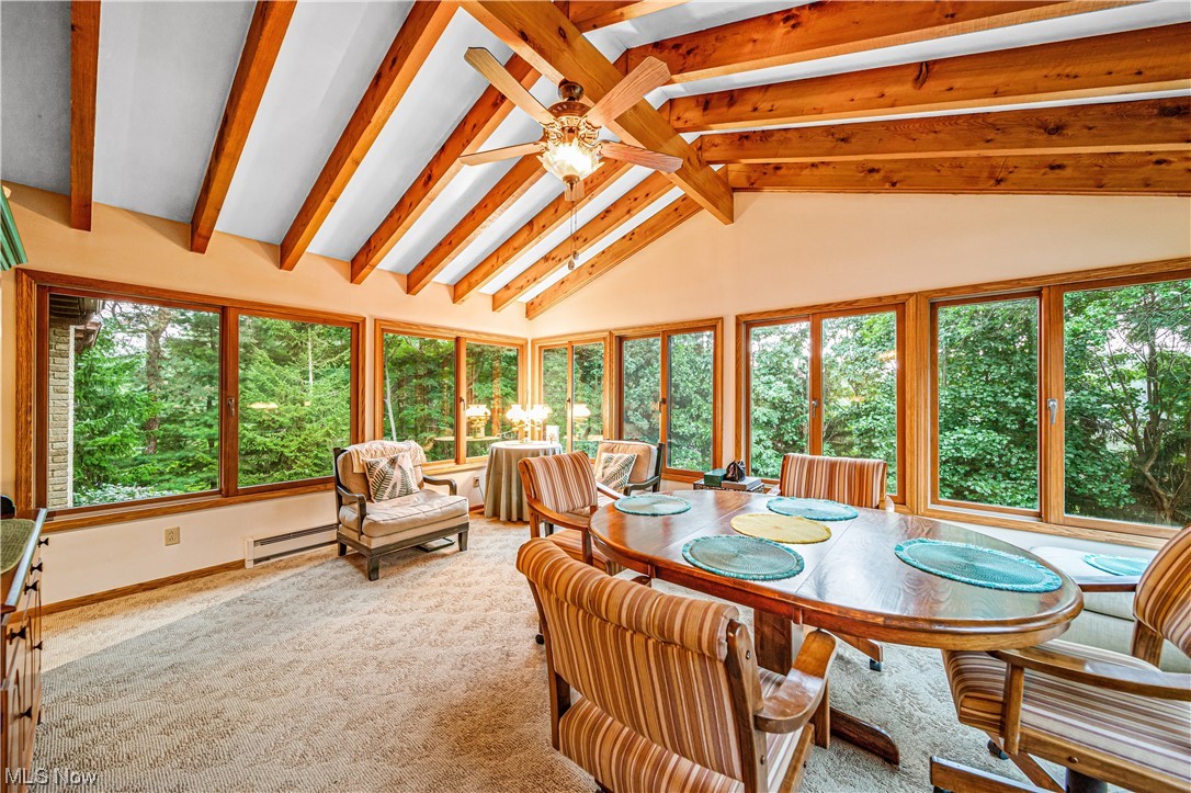 35510 Ridge Road Willoughby, OH 44094 - Photo 13 of 35 Sunroom featuring vaulted ceiling with beams, a healthy amount of sunlight, and ceiling fan