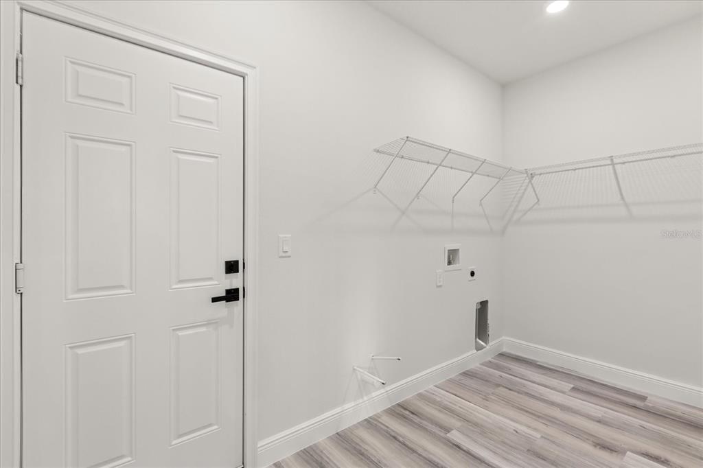 2097 Southwest 153rd Loop Ocala, FL 34481 - Photo 24 of 39 a view of room with racks on the wall