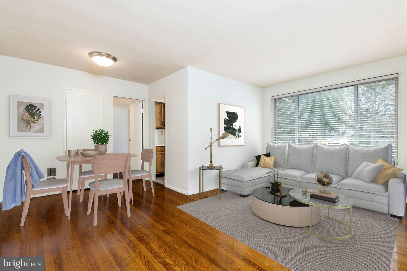 1920 North Calvert Street, Unit 1 BR 1 Arlington, VA 22201 - Photo 9 of 9 a living room with furniture and wooden floor