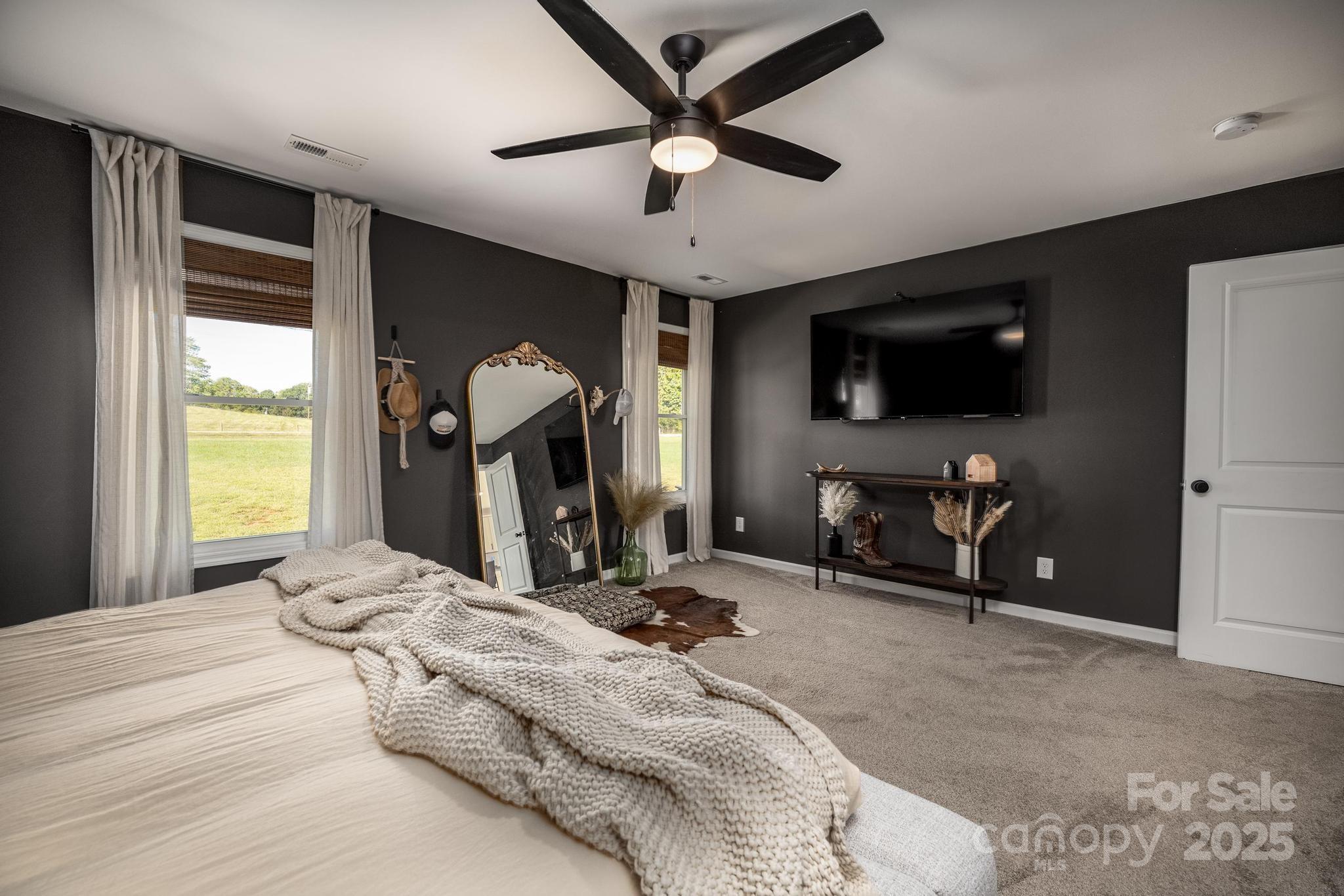 2256 Bolton Road Catawba, NC 28609 - Photo 21 of 48 a bedroom with a bed a flat screen tv and dresser