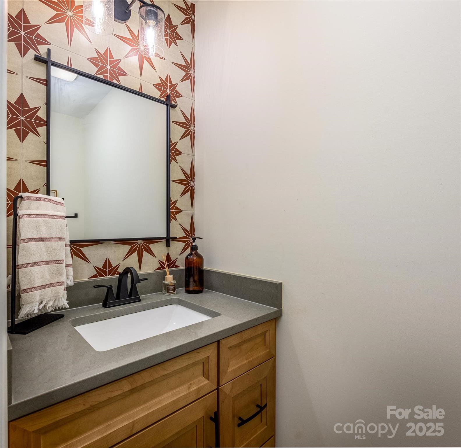 2256 Bolton Road Catawba, NC 28609 - Photo 27 of 48 a bathroom with a sink and a mirror
