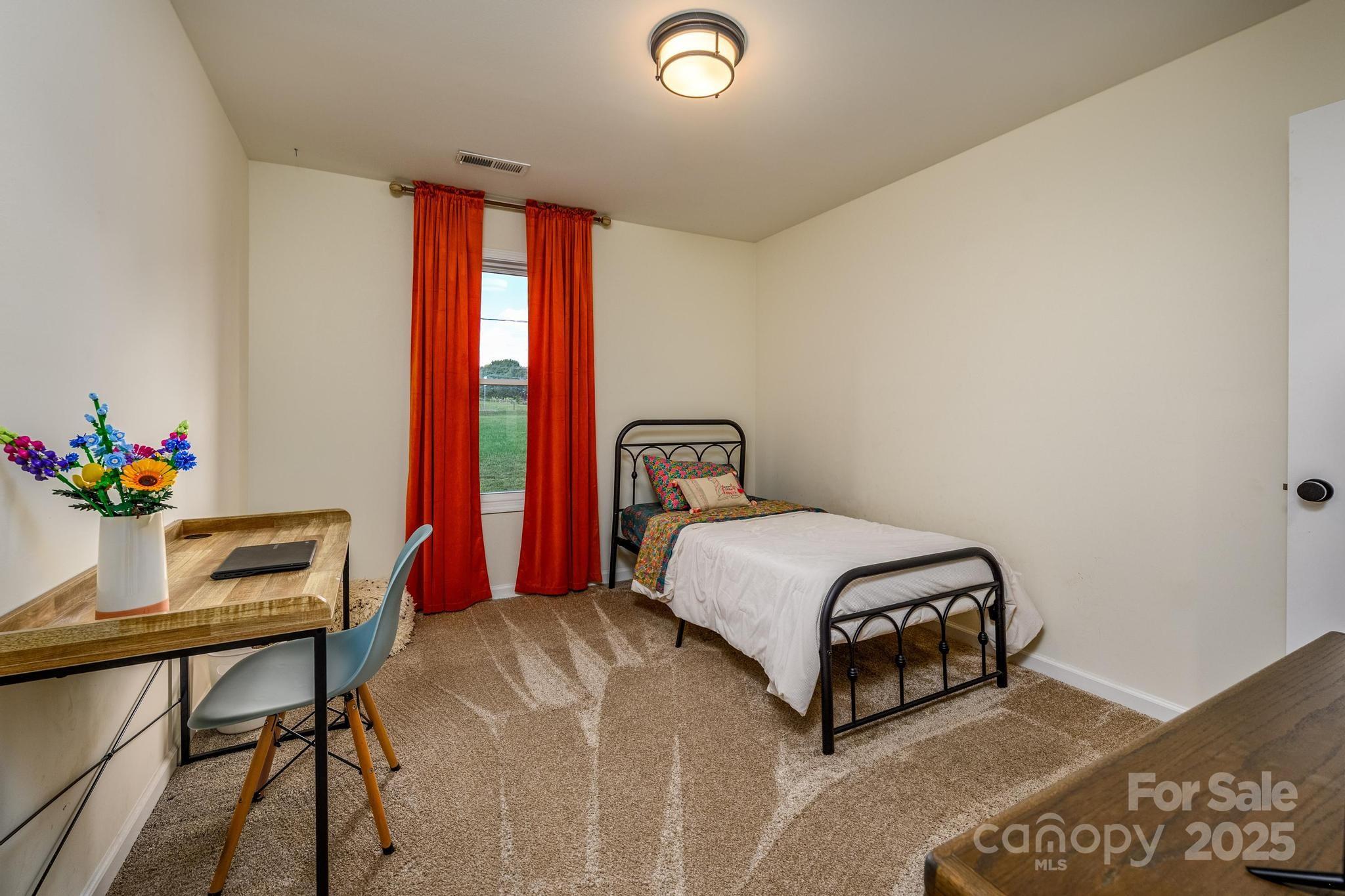 2256 Bolton Road Catawba, NC 28609 - Photo 31 of 48 a bedroom with a bed and a table