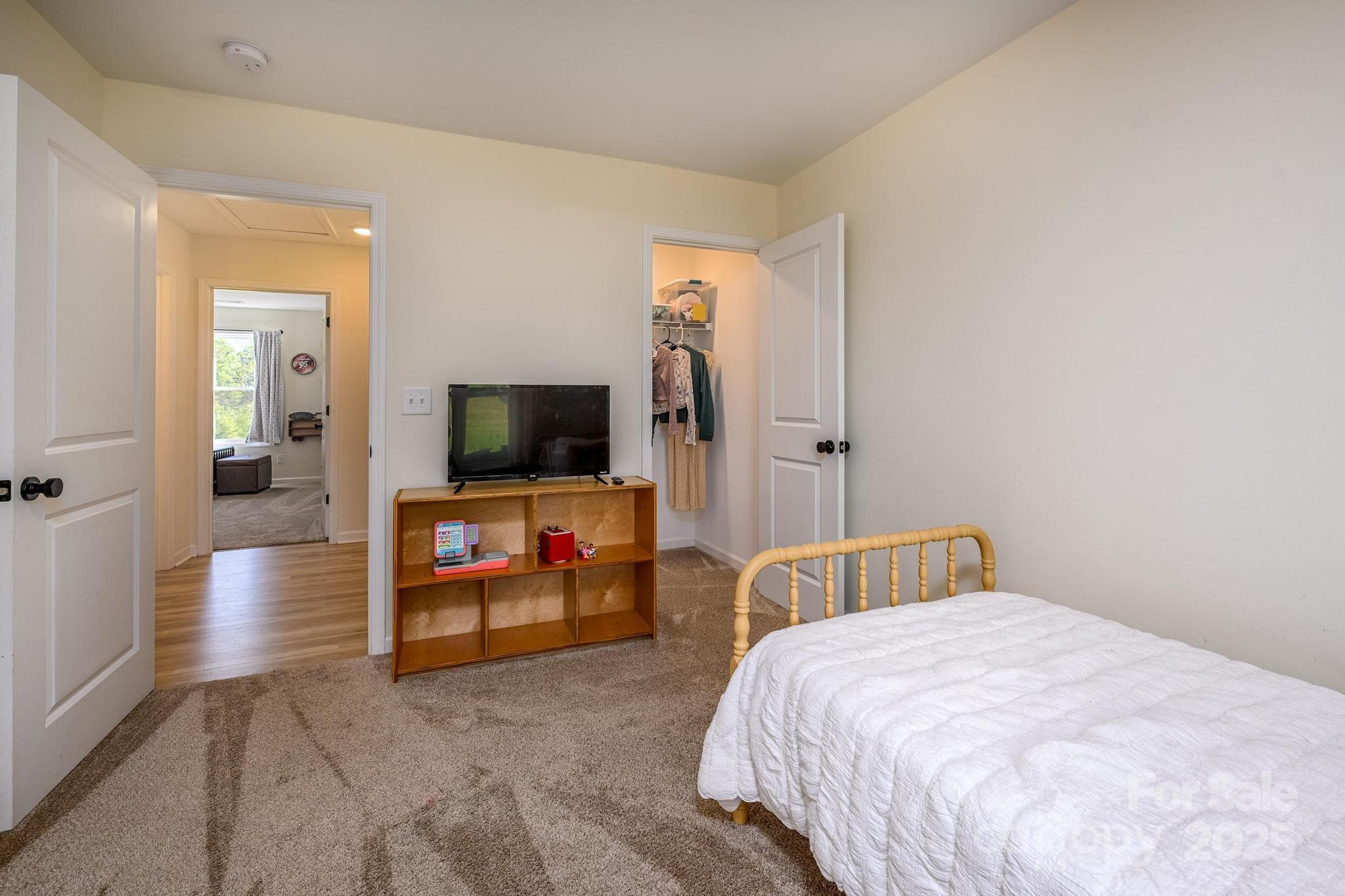 2256 Bolton Road Catawba, NC 28609 - Photo 33 of 48 a bedroom with a bed and a flat screen tv