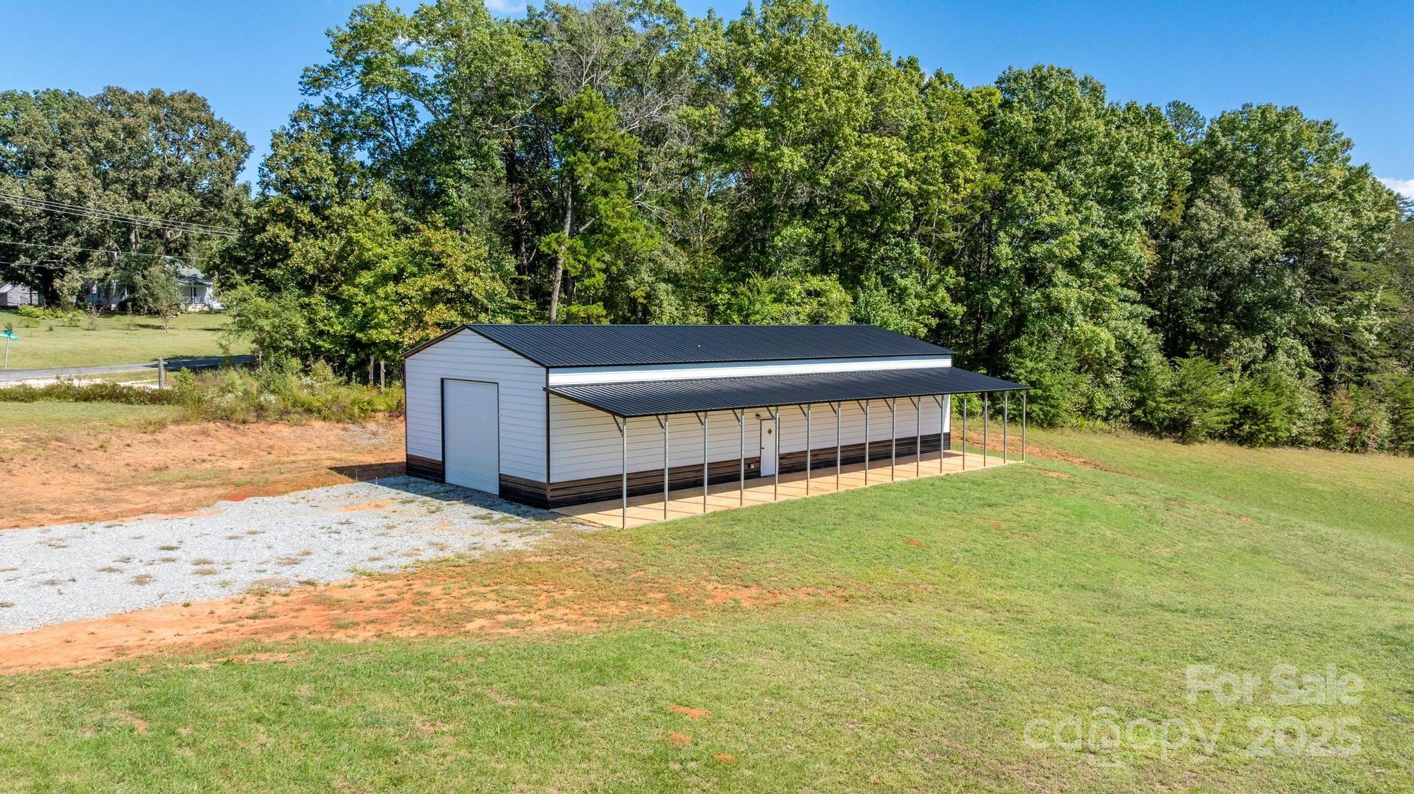 2256 Bolton Road Catawba, NC 28609 - Photo 35 of 48 a view of a house with a yard and sitting area