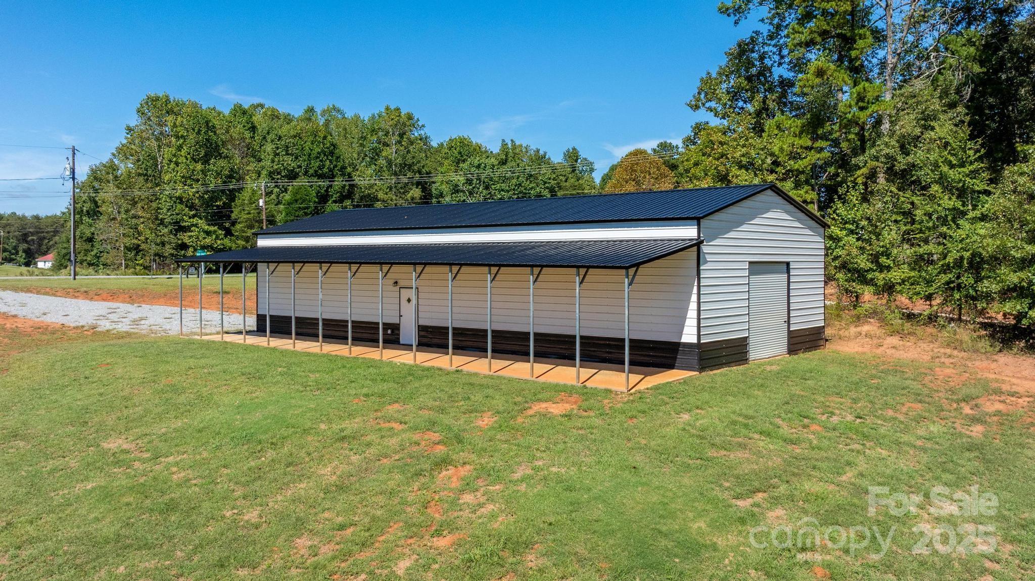 2256 Bolton Road Catawba, NC 28609 - Photo 38 of 48 a view of a house with backyard and garden