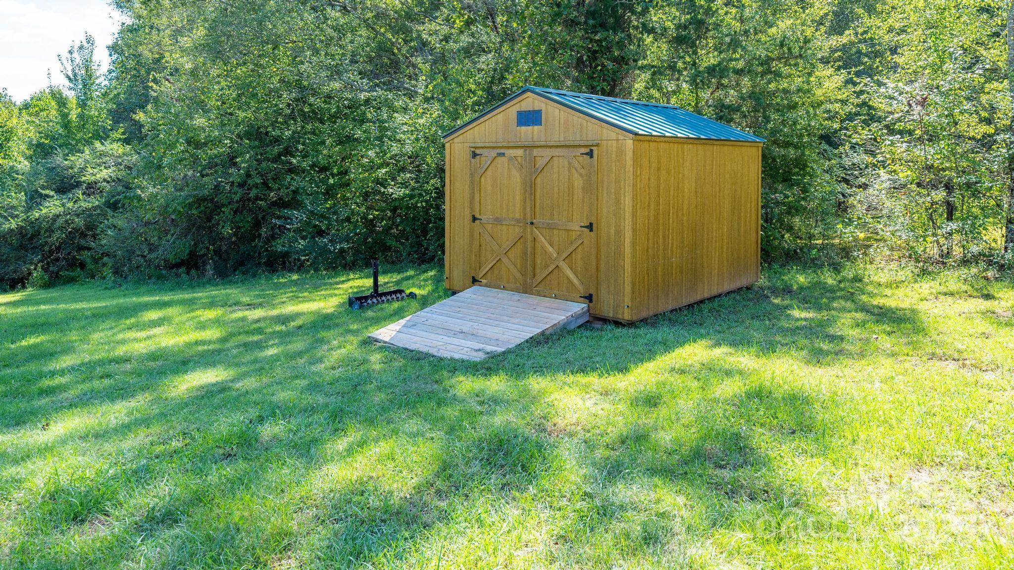 2256 Bolton Road Catawba, NC 28609 - Photo 40 of 48 a view of a back yard of the house