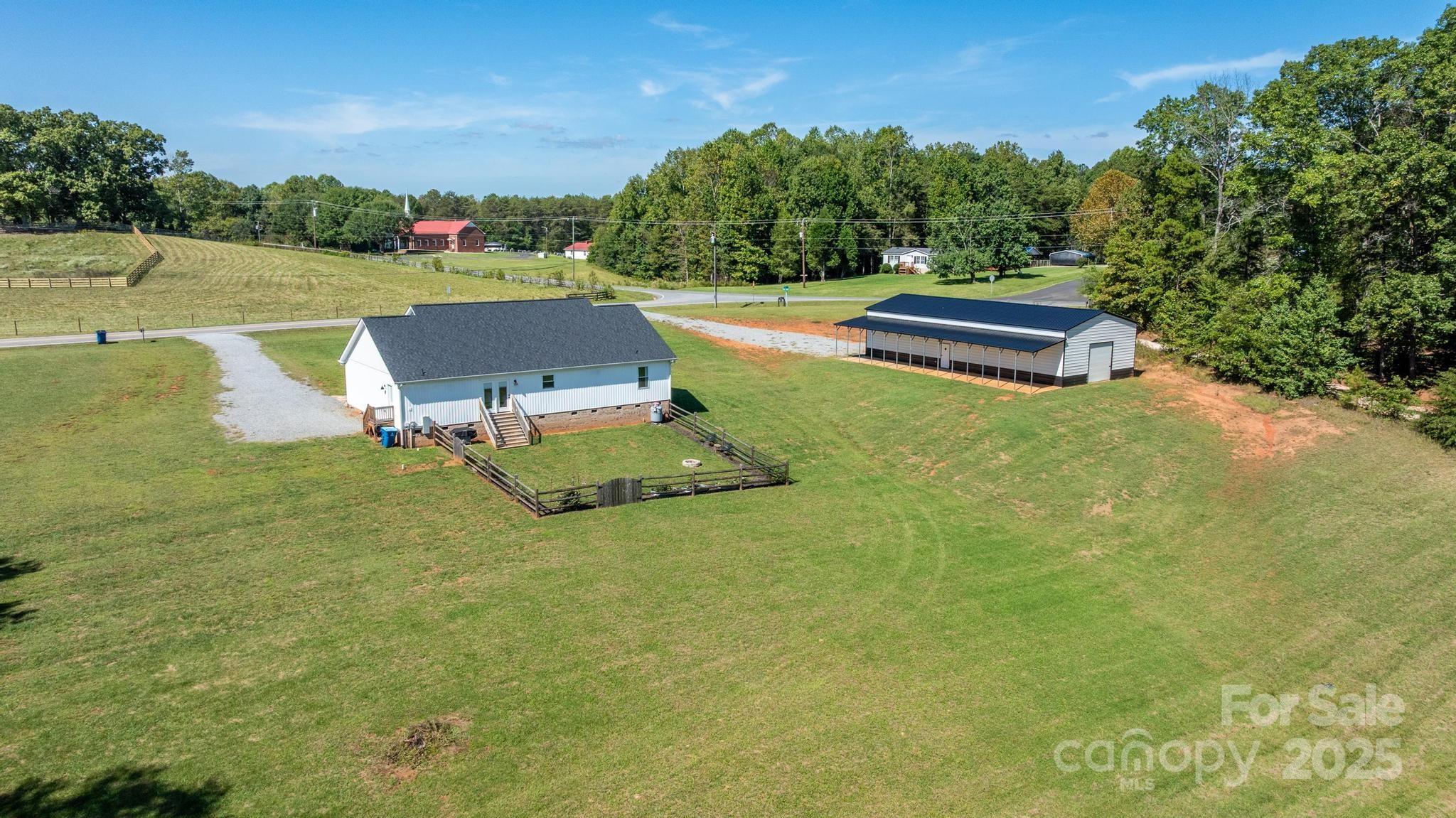 2256 Bolton Road Catawba, NC 28609 - Photo 42 of 48 an aerial view of a house with garden space and street view
