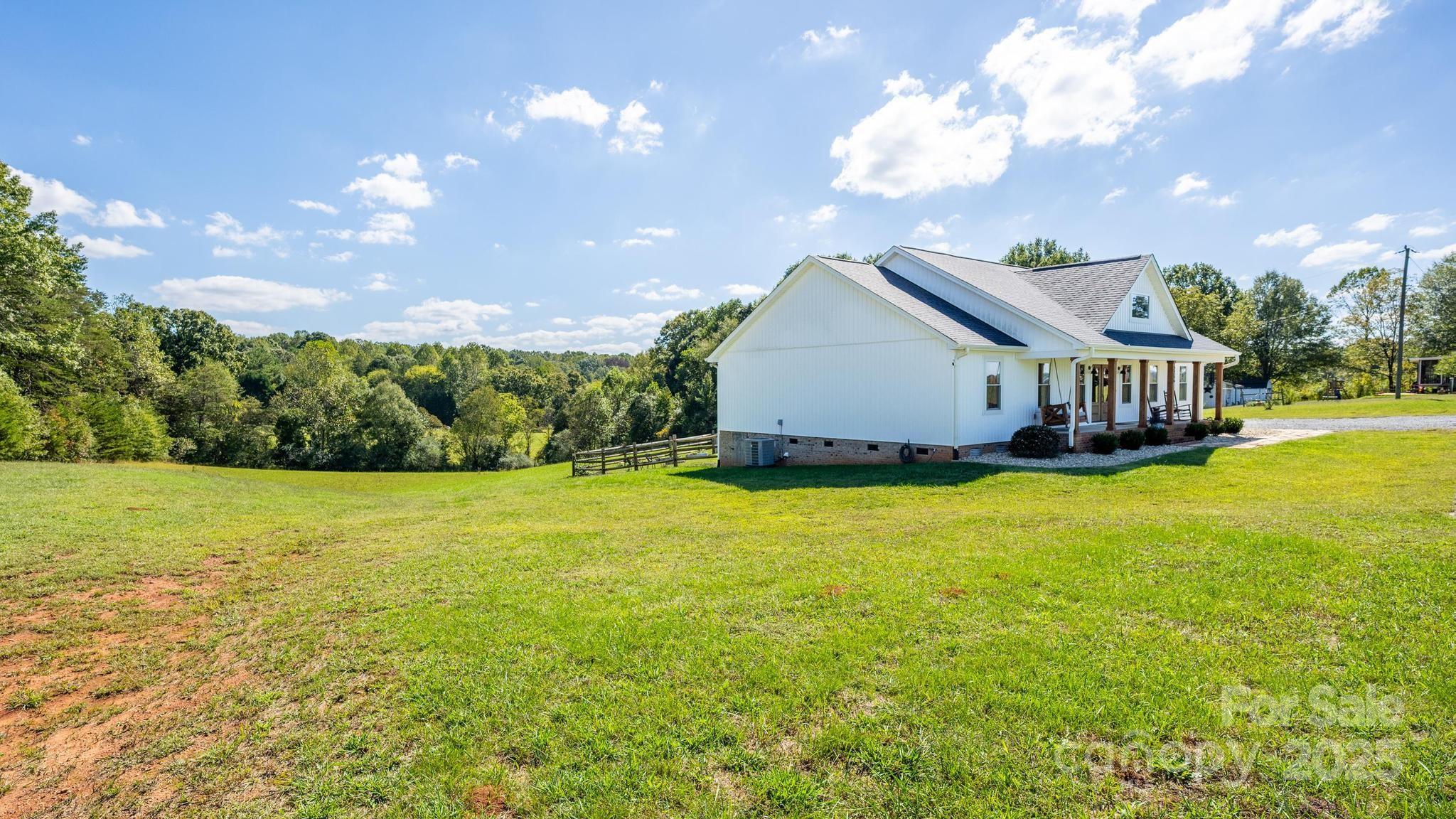 2256 Bolton Road Catawba, NC 28609 - Photo 43 of 48 a view of a house with a yard