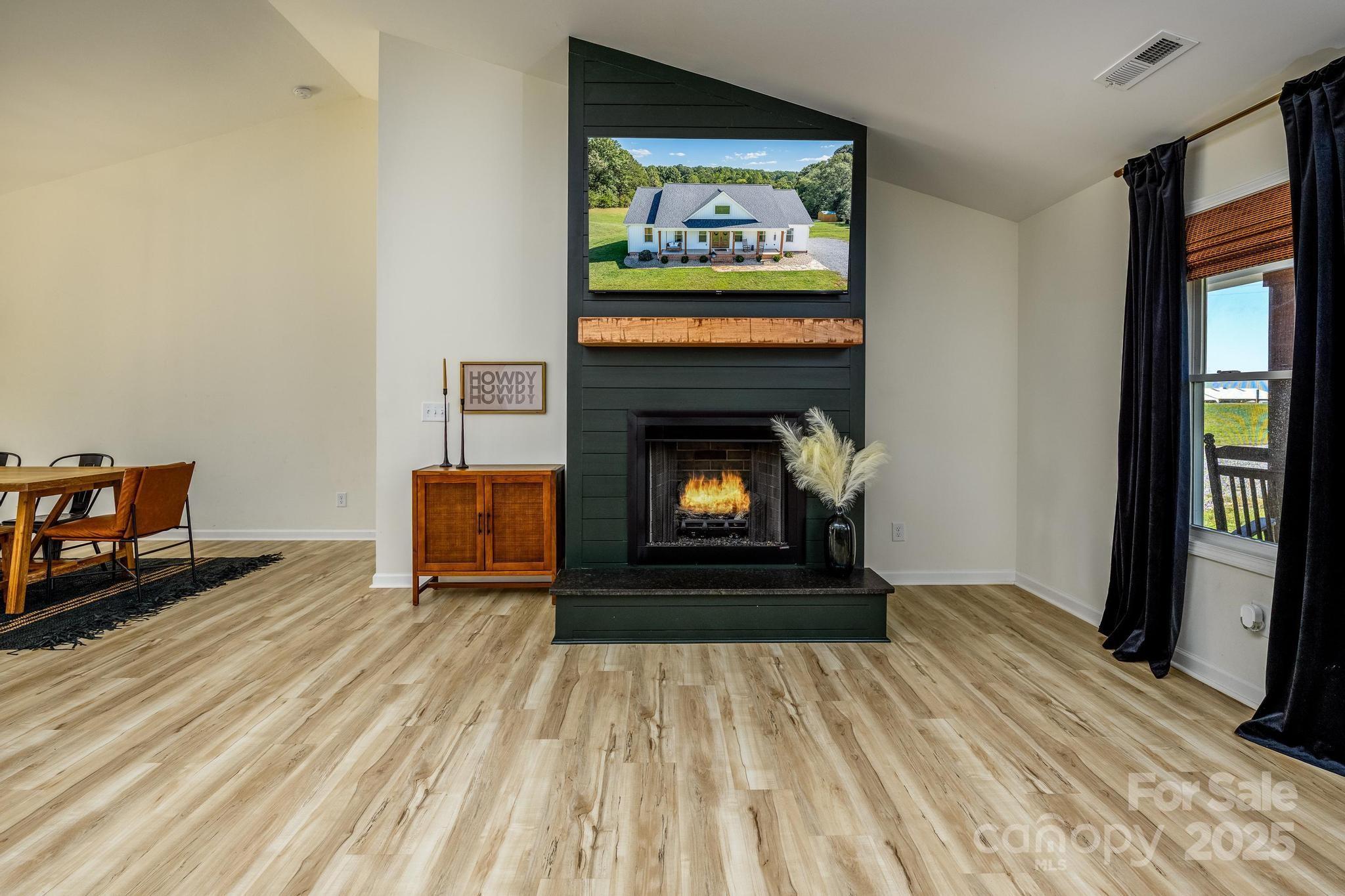 2256 Bolton Road Catawba, NC 28609 - Photo 10 of 48 a living room with furniture and a fireplace