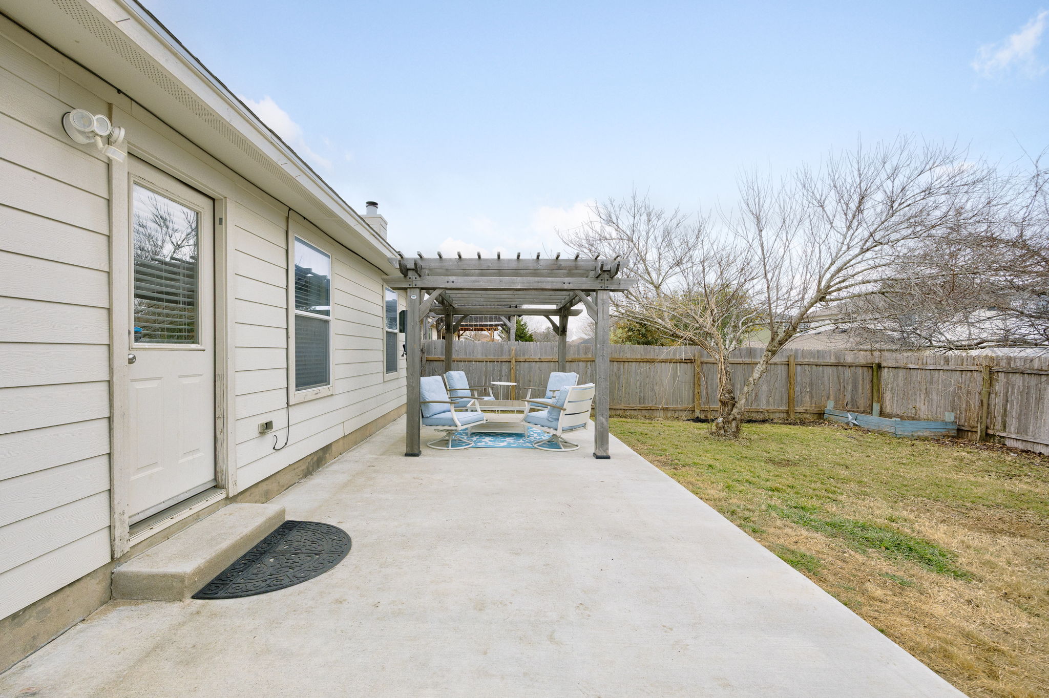 304 Old Peak Road Georgetown, TX 78626 - Photo 23 of 40 Fenced backyard with a pergola and a patio