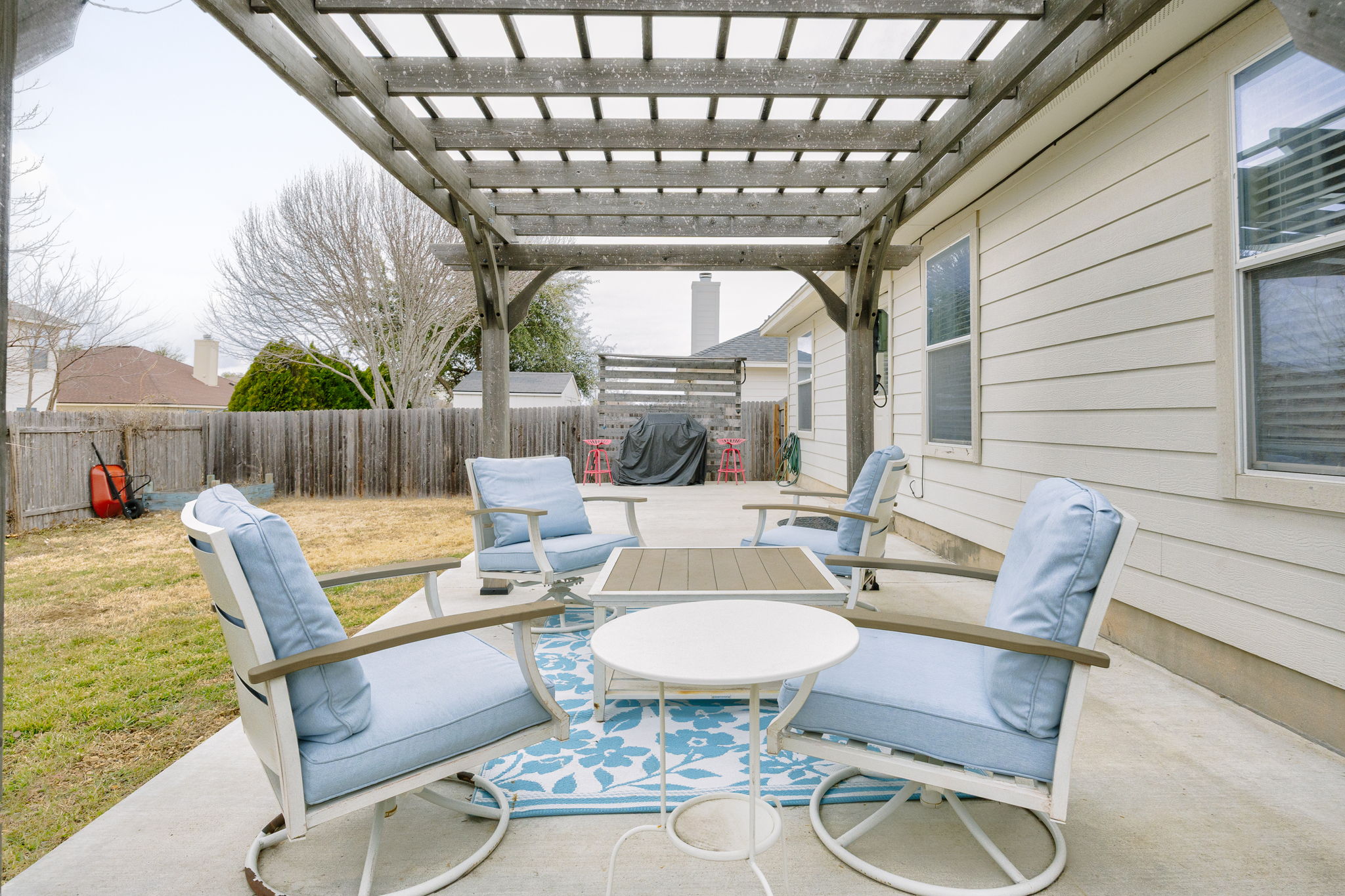 304 Old Peak Road Georgetown, TX 78626 - Photo 24 of 40 Fenced backyard featuring a patio, a pergola, and area for grilling