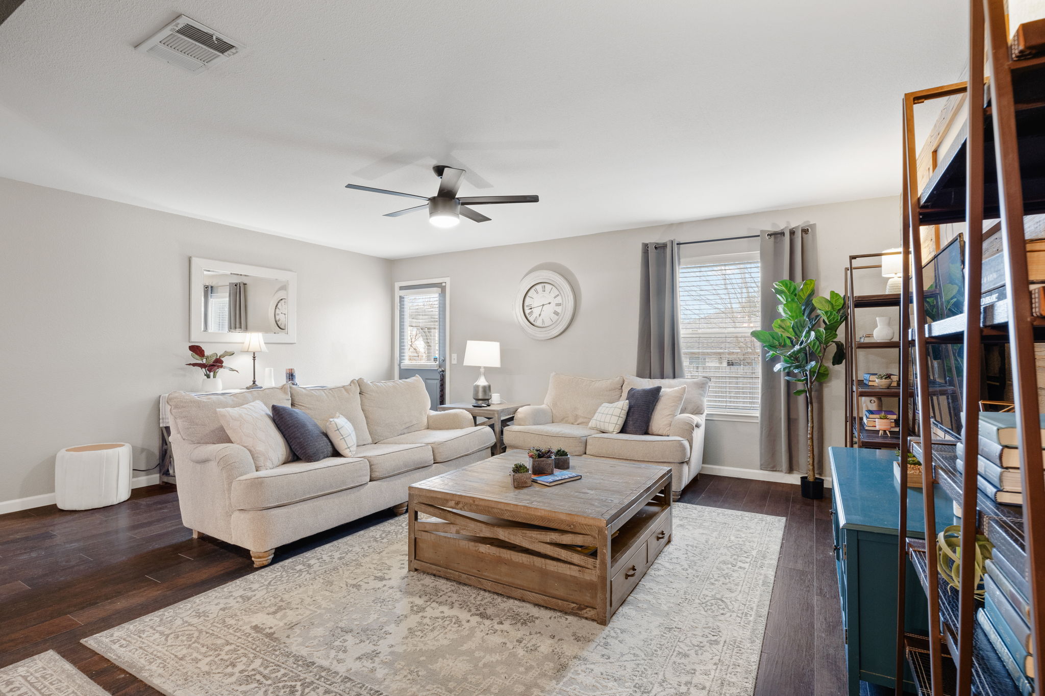 304 Old Peak Road Georgetown, TX 78626 - Photo 8 of 40 Living area with a ceiling fan, dark wood-style floors, and healthy amount of natural light