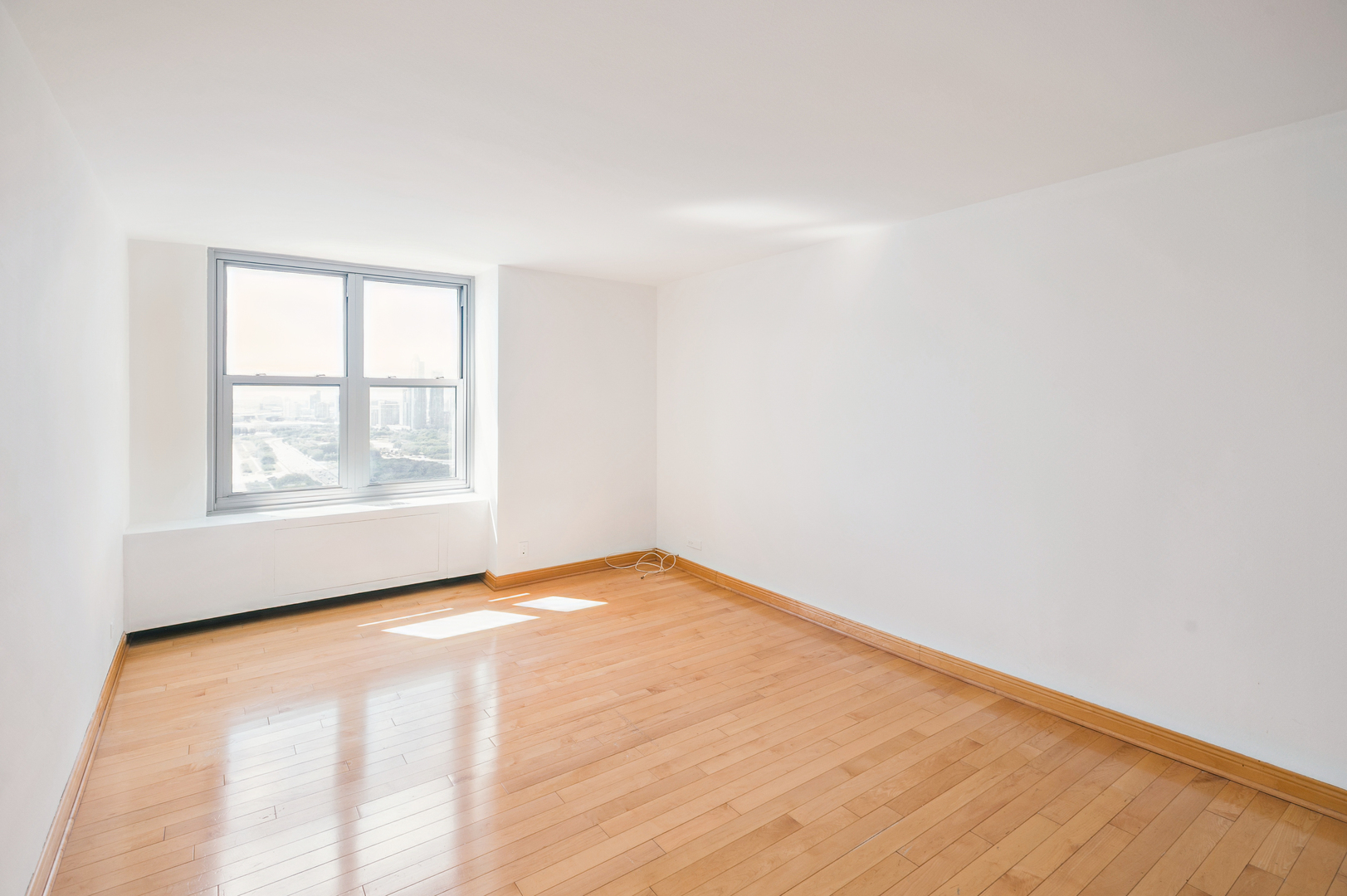 400 East Randolph Street, Unit 3905 Chicago, IL 60601 - Photo 20 of 55 a view of an empty room with a window
