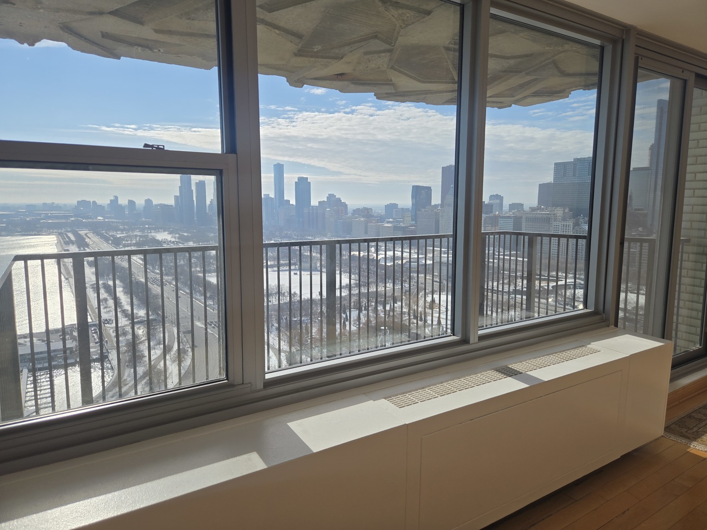 400 East Randolph Street, Unit 3905 Chicago, IL 60601 - Photo 2 of 55 a view of a balcony with a floor to ceiling window