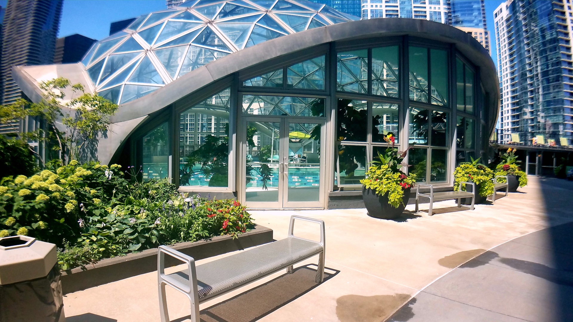 400 East Randolph Street, Unit 3905 Chicago, IL 60601 - Photo 45 of 55 a view of a chair and tables in the patio in front of house