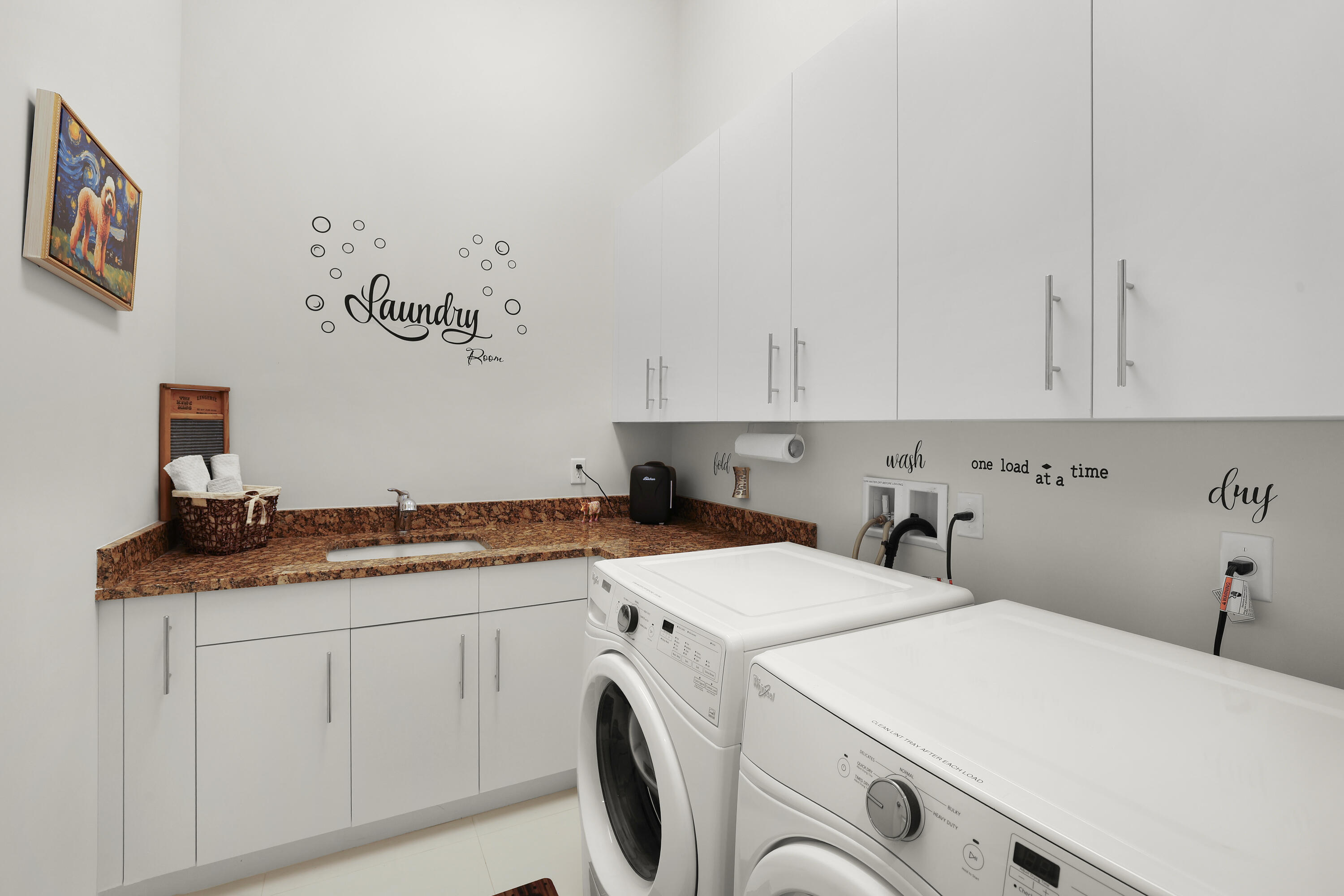 144 Tierra Lane, Unit 13 Jupiter, FL 33477 - Photo 34 of 42 144 Tierra Lane 13 Jupiter Laundry Room