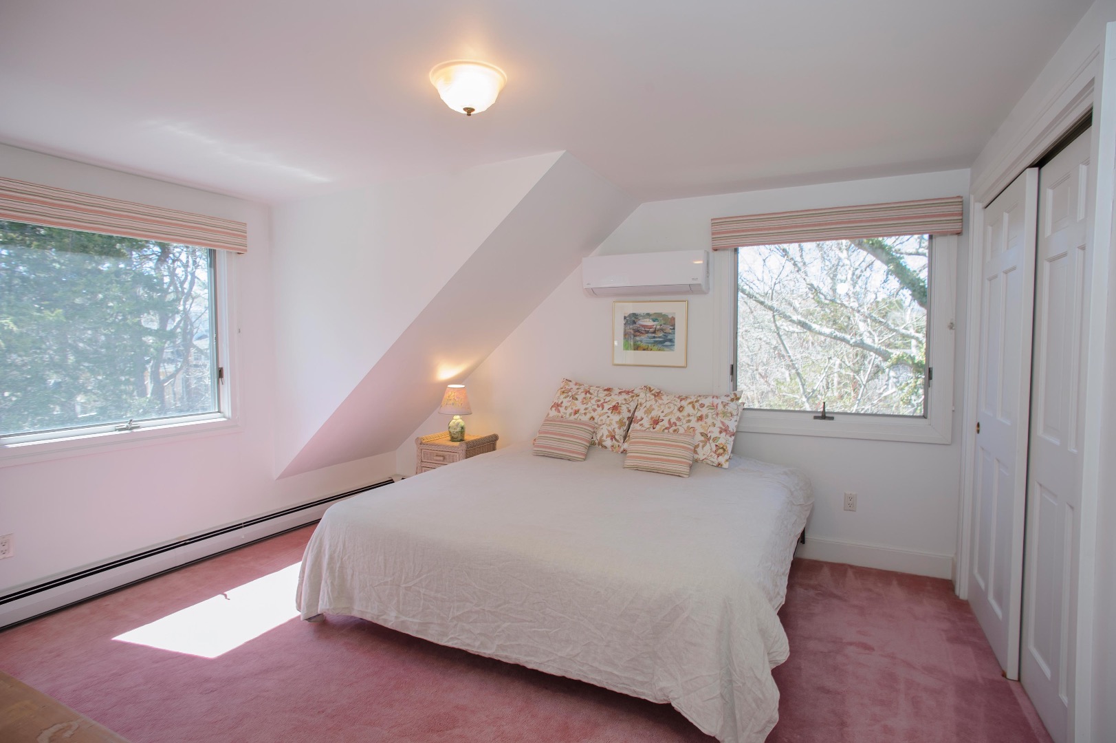 237 Lagoon Pond Road Vineyard Haven, MA 02568 - Photo 15 of 21 a bedroom with a large bed and a window