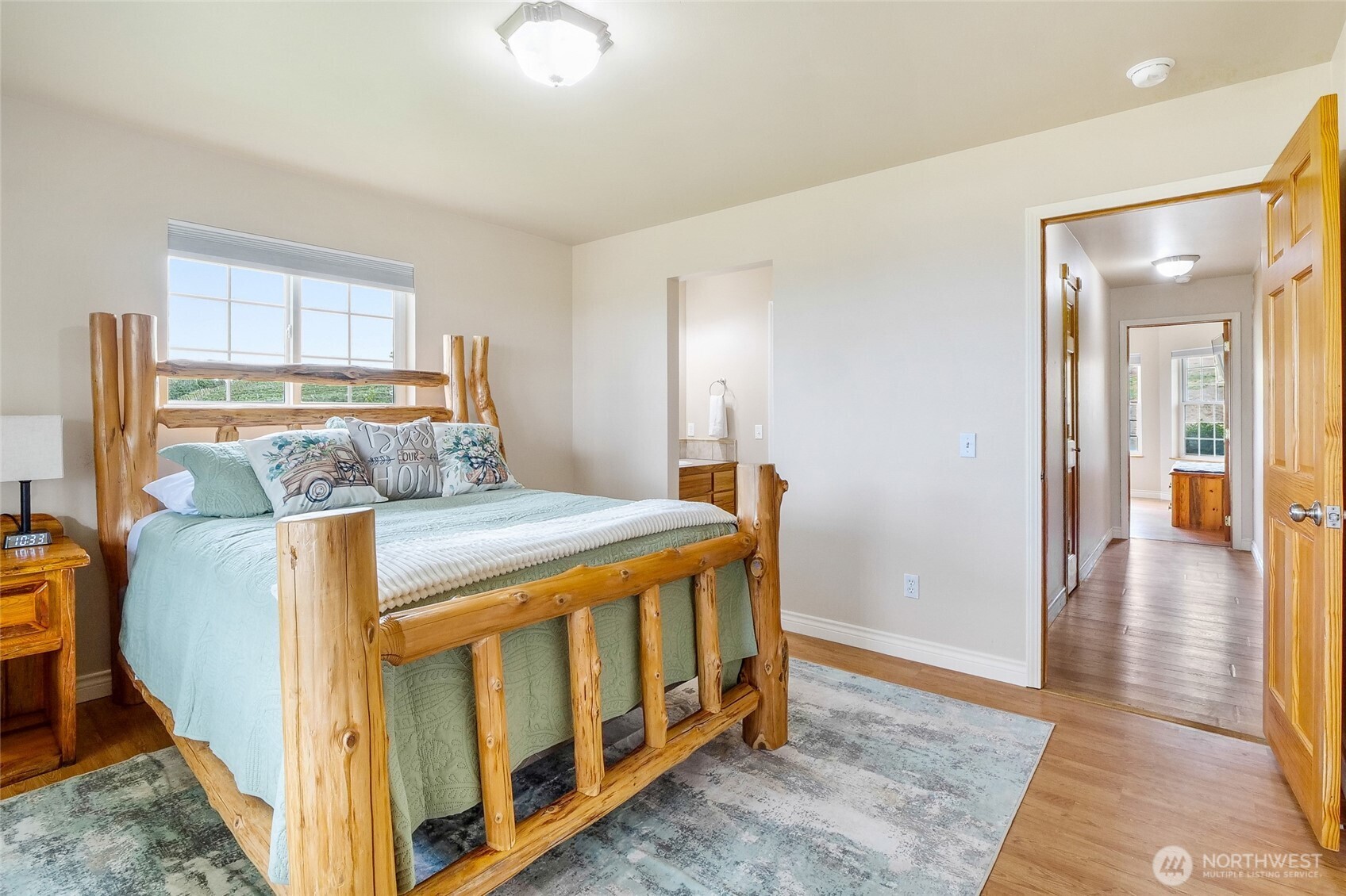 201 Vanderbilt Road Ellensburg, WA 98926 - Photo 27 of 40 a bedroom with a bed and a view of kitchen