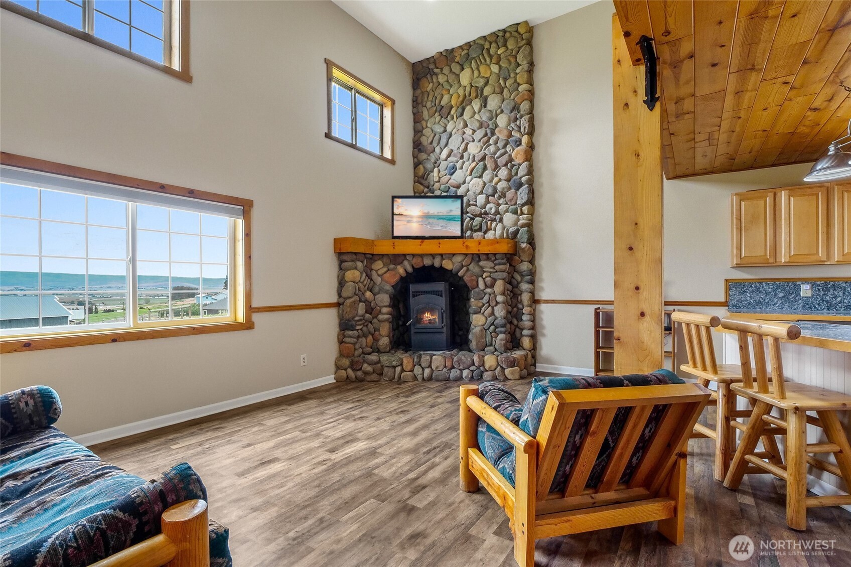 201 Vanderbilt Road Ellensburg, WA 98926 - Photo 35 of 40 a living room with furniture a window and a fireplace