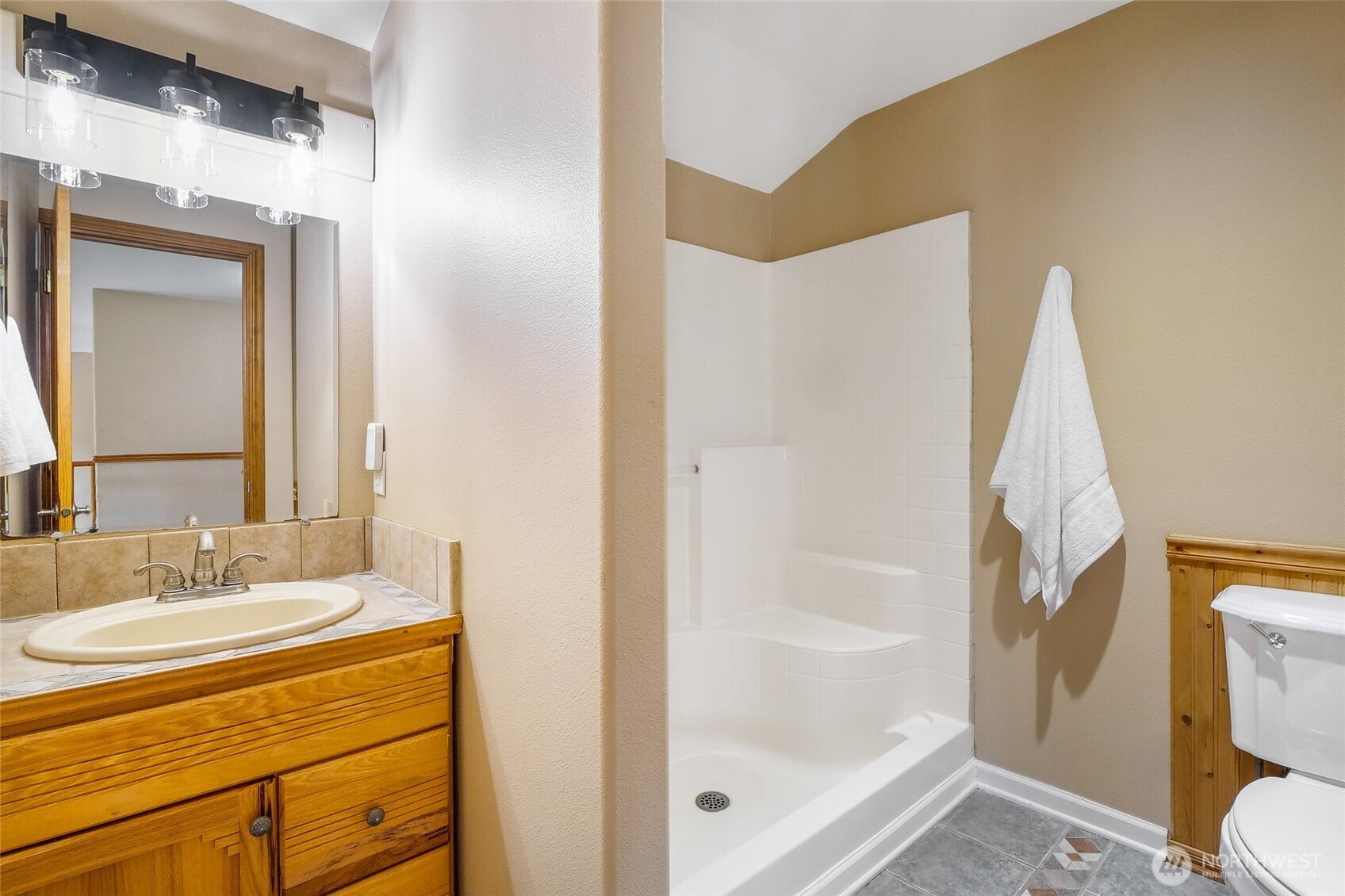 201 Vanderbilt Road Ellensburg, WA 98926 - Photo 39 of 40 a bathroom with a granite countertop sink toilet and shower