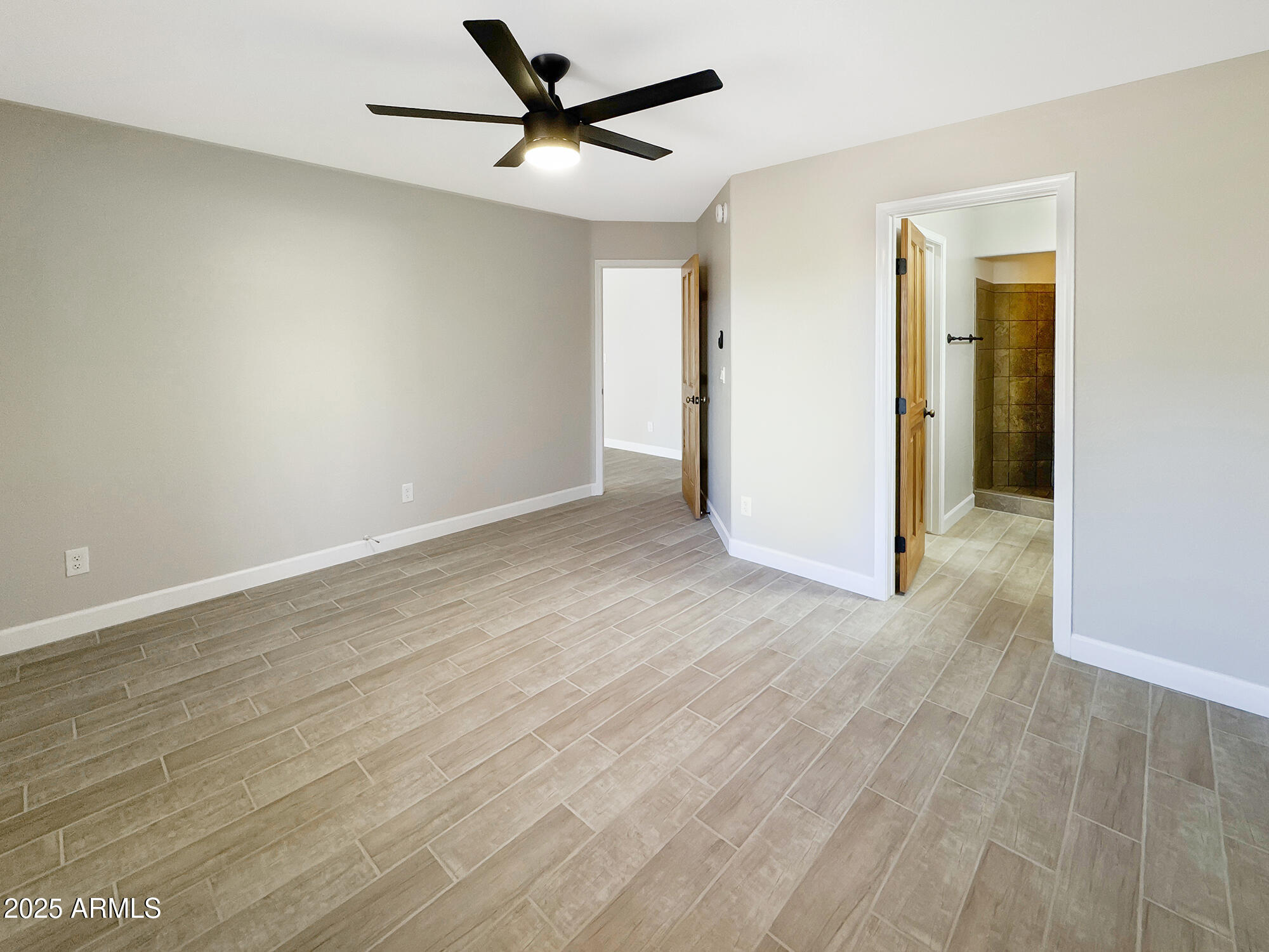 321 South Golden Bear Point Payson, AZ 85541 - Photo 13 of 23 an empty room with wooden floor and ceiling fan