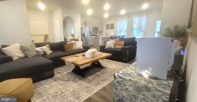 a living room with furniture and a couch