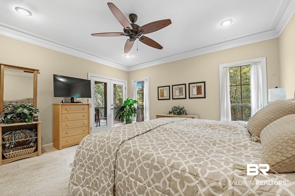29976 Dolive Ridge Daphne, AL 36527 - Photo 29 of 58 Bedroom with ornamental molding, carpet, access to exterior, and ceiling fan