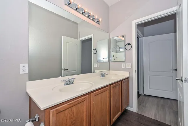 a view of a kitchen from the hallway