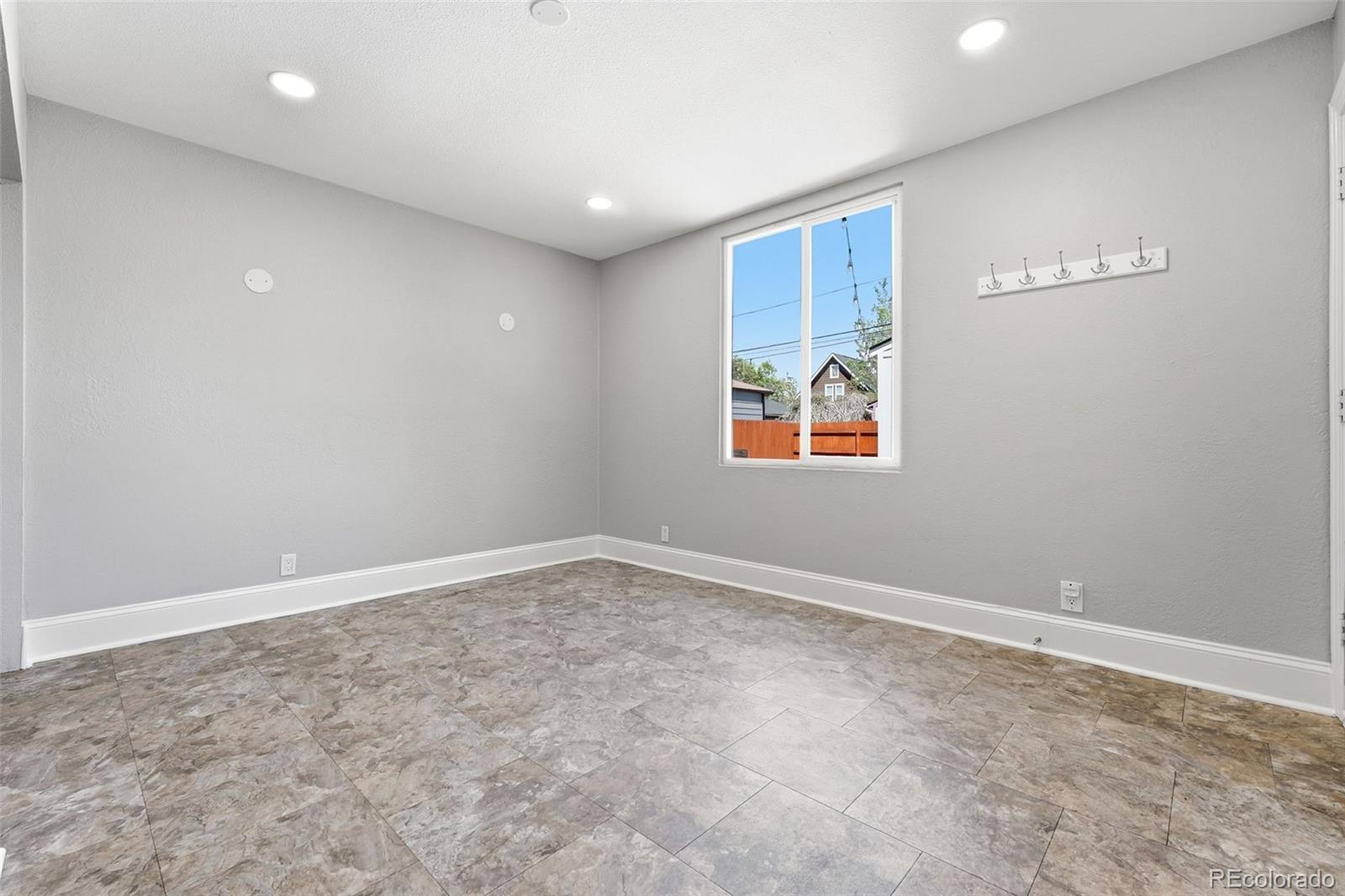 3324 Franklin Street Denver, CO 80205 - Photo 37 of 50 an empty room with a window
