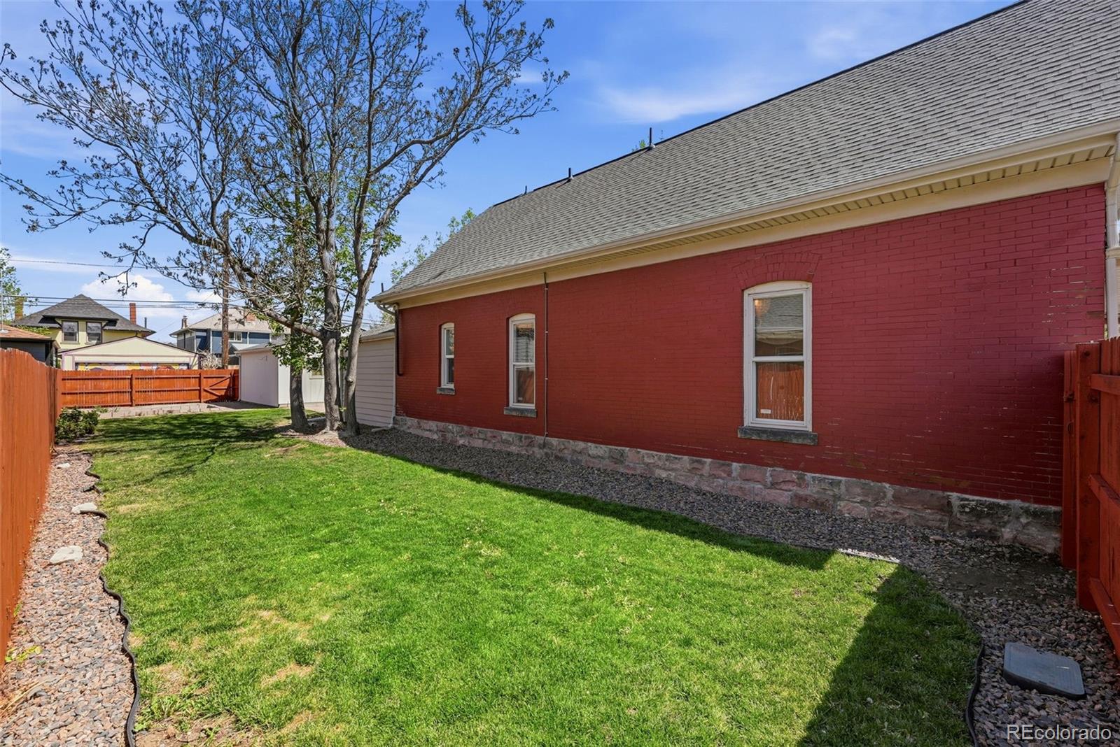 3324 Franklin Street Denver, CO 80205 - Photo 46 of 50 a view of a backyard with a garden