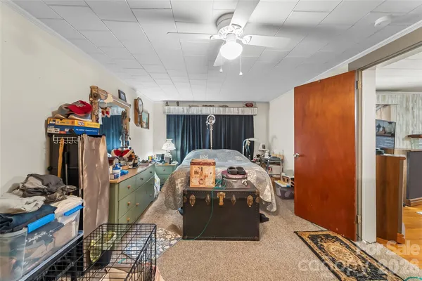 a room with furniture and a chandelier