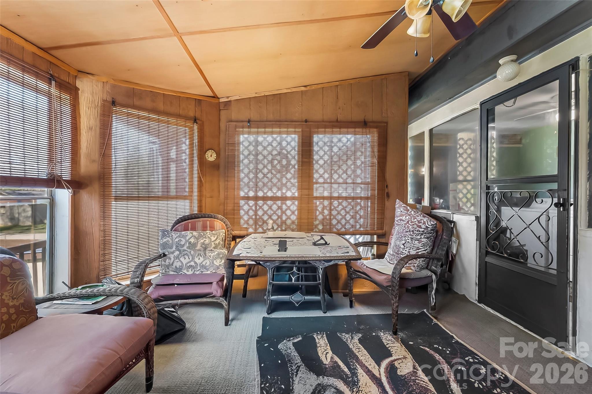 2706 Connelly Springs Road Granite Falls, NC 28630 - Photo 21 of 34 a outdoor living space with furniture and a window