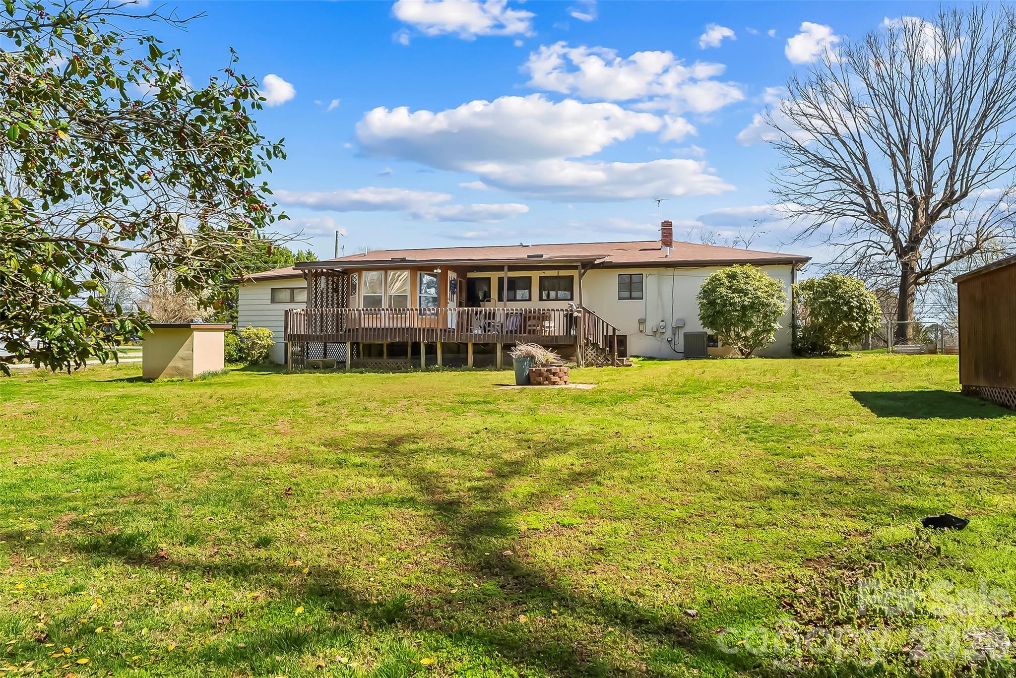 2706 Connelly Springs Road Granite Falls, NC 28630 - Photo 23 of 34 a view of house with a big yard