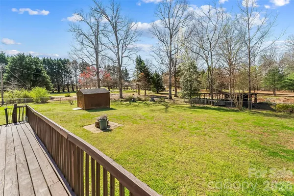 a view of a house with a big yard