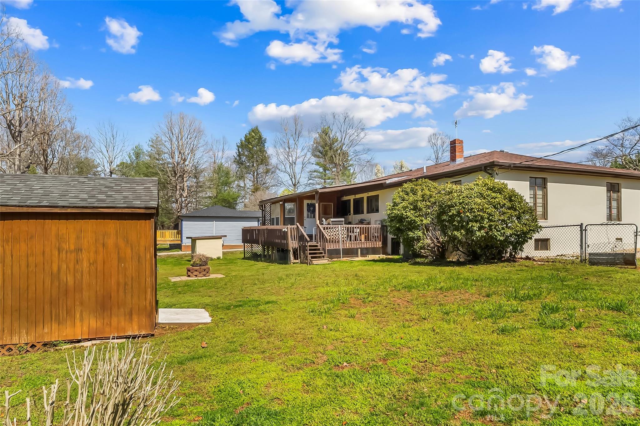 2706 Connelly Springs Road Granite Falls, NC 28630 - Photo 28 of 34 a view of a house with a big yard