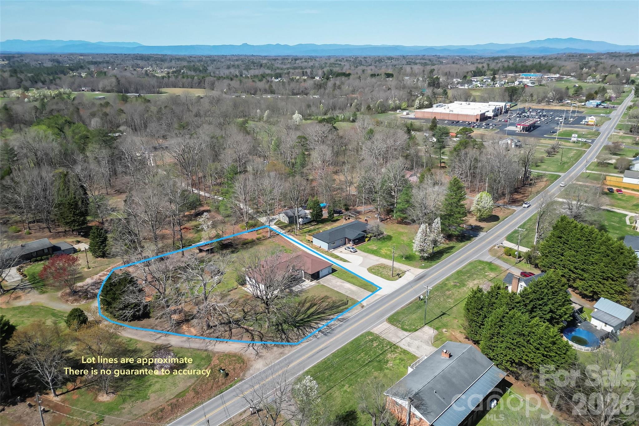 2706 Connelly Springs Road Granite Falls, NC 28630 - Photo 30 of 34 an aerial view of a house with a yard