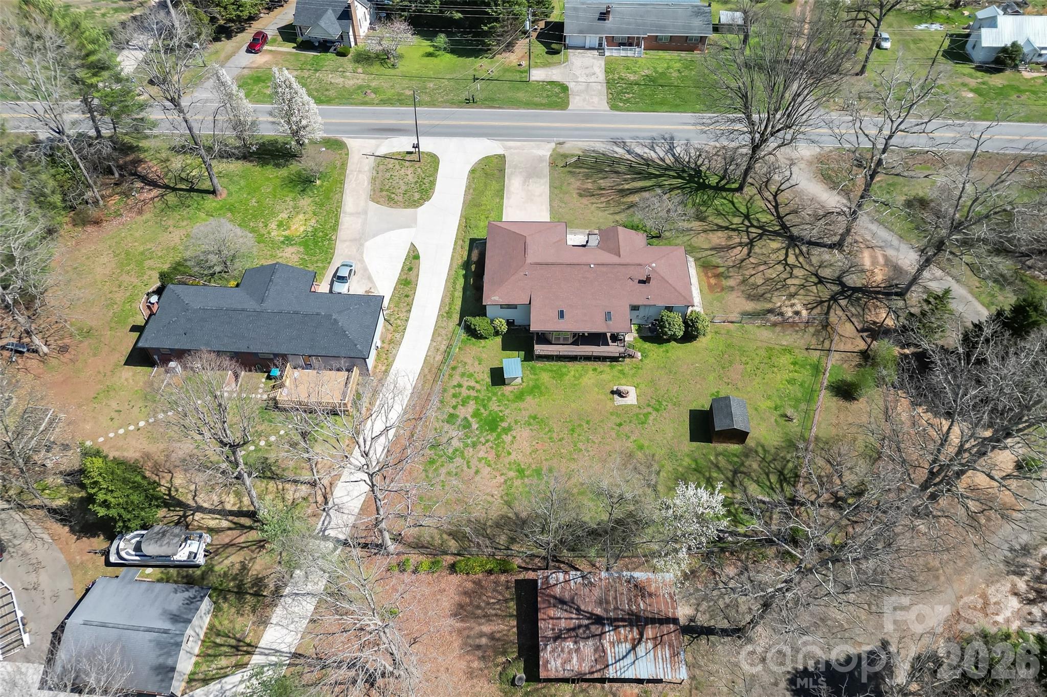 2706 Connelly Springs Road Granite Falls, NC 28630 - Photo 33 of 34 an aerial view of a house with outdoor space