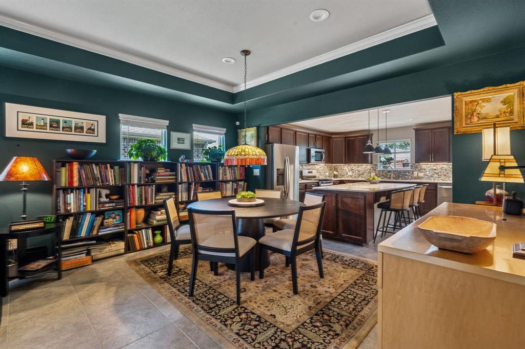 1884 Marsh Point Drive Frisco, TX 75036 - Photo 2 of 23 a view of a dining room with furniture