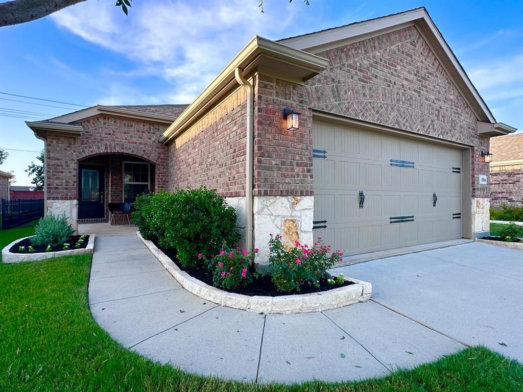 1884 Marsh Point Drive Frisco, TX 75036 - Photo 5 of 23 a view of a house with a yard