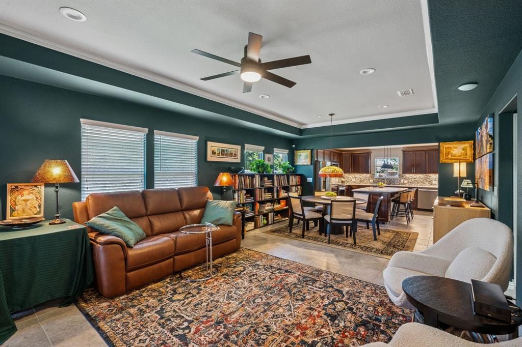 1884 Marsh Point Drive Frisco, TX 75036 - Photo 8 of 23 a living room with furniture kitchen view and a large window