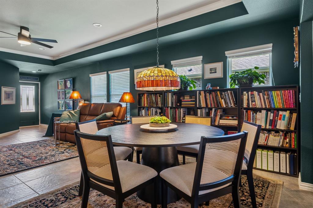 1884 Marsh Point Drive Frisco, TX 75036 - Photo 9 of 23 a view of a dining room with furniture window and wooden floor