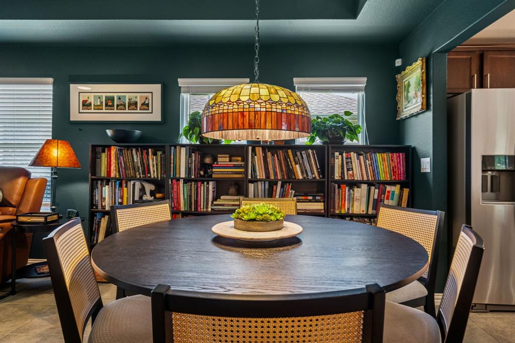 1884 Marsh Point Drive Frisco, TX 75036 - Photo 10 of 23 a living room with furniture and a table