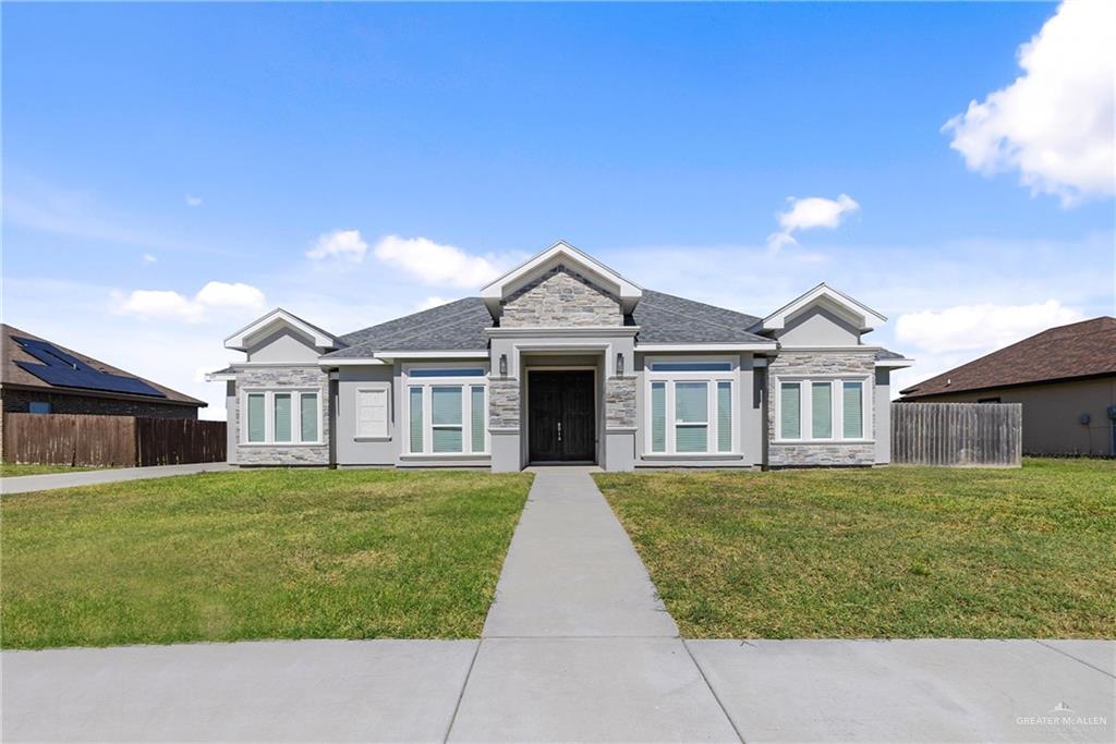 a house view with a garden space