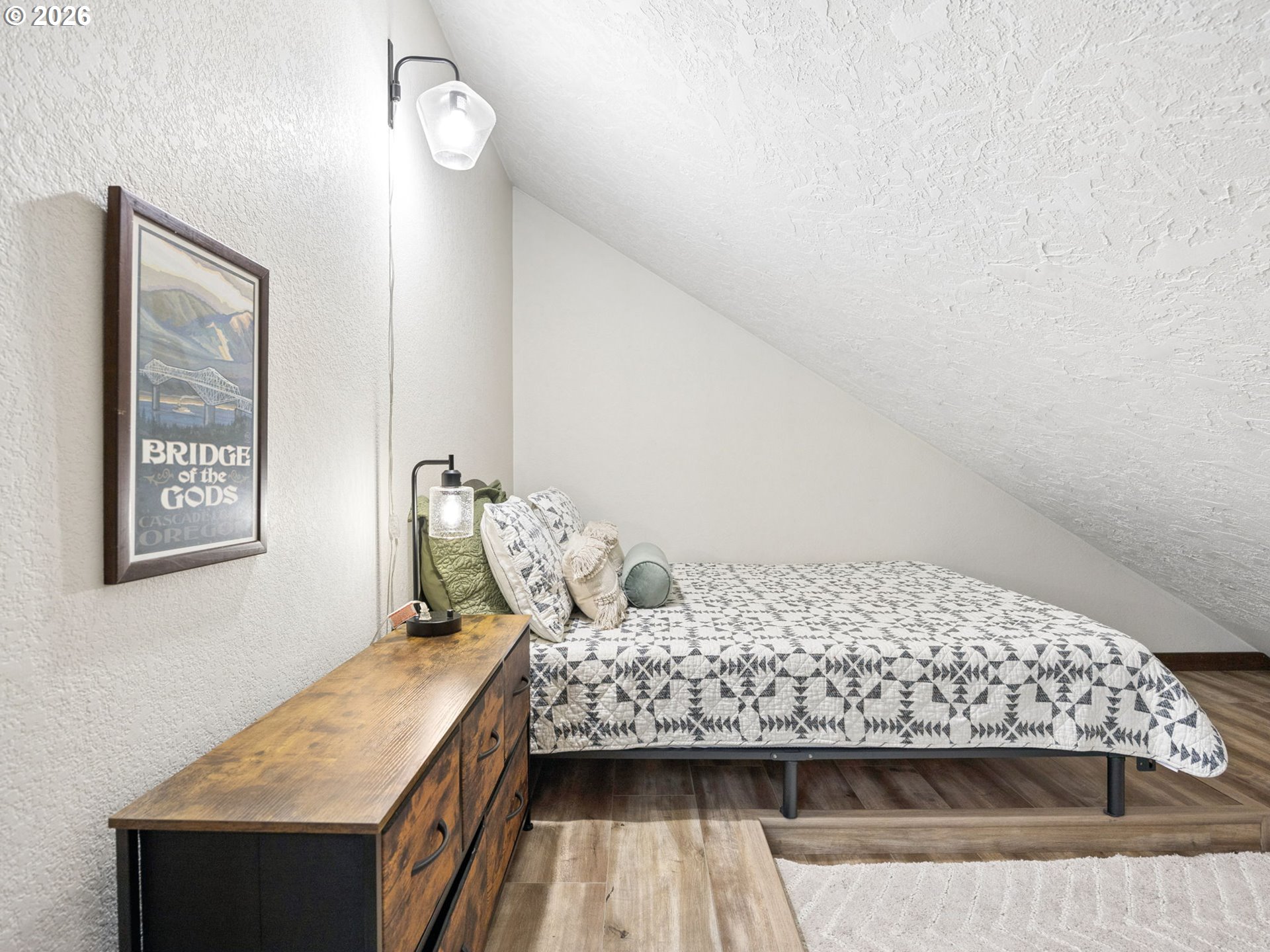 65582 East Timberline Drive Rhododendron, OR 97049 - Photo 20 of 47 a bedroom with a bed and wooden floor