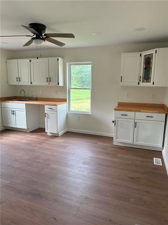 89 Old 51 Road Perryopolis, PA 15473 - Photo 7 of 45 a view of a kitchen with a sink and cabinets