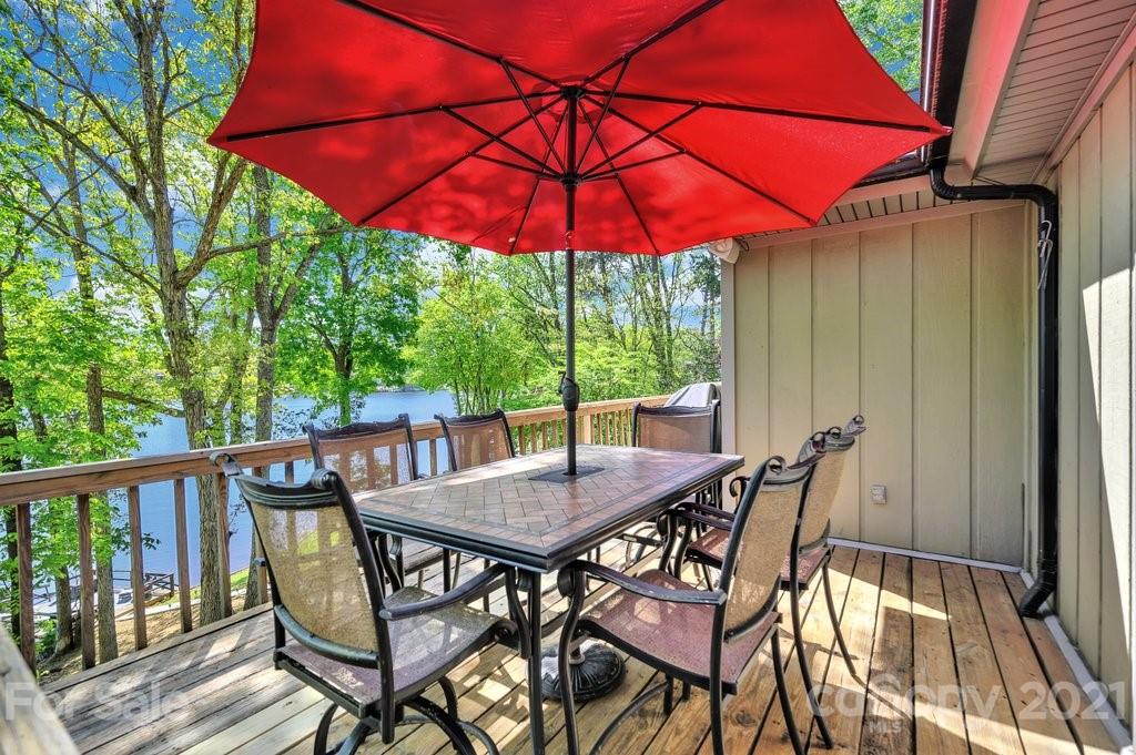 16123 Tana Tea Circle Tega Cay, SC 29708 - Photo 15 of 42 a view of an outdoor space with furniture and umbrella