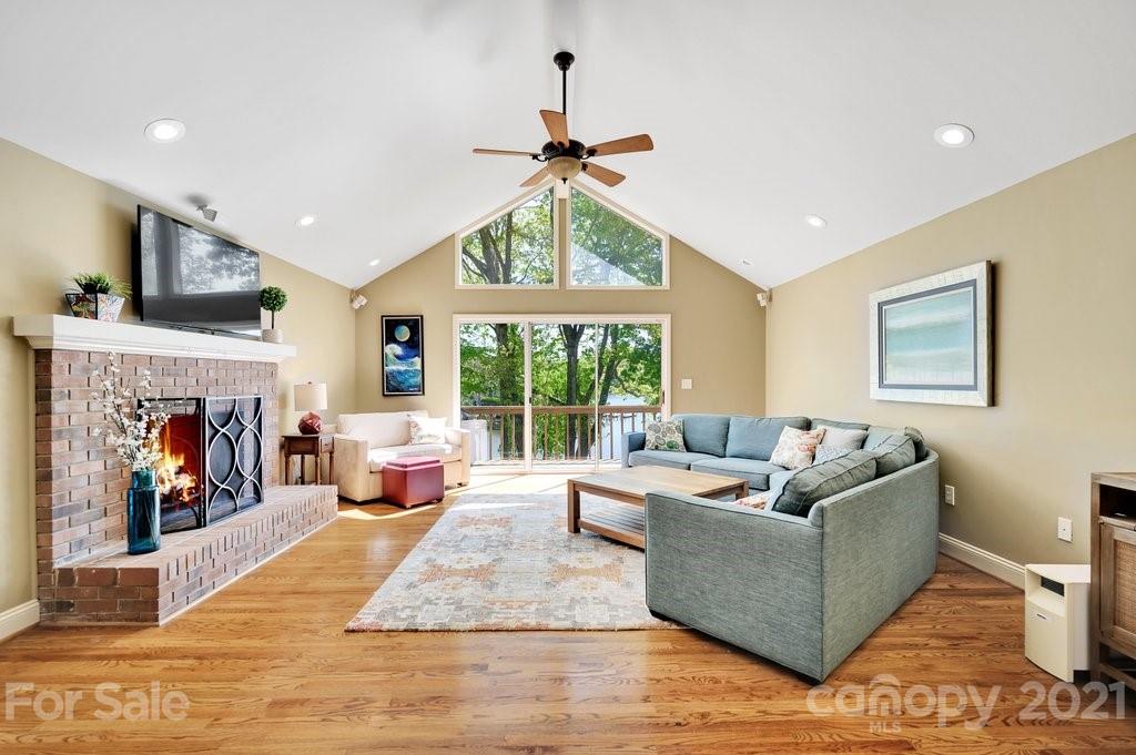 16123 Tana Tea Circle Tega Cay, SC 29708 - Photo 16 of 42 a living room with furniture and a fireplace