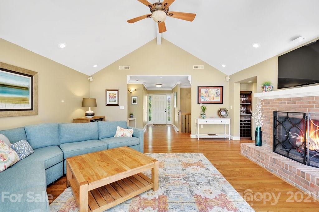 16123 Tana Tea Circle Tega Cay, SC 29708 - Photo 19 of 42 a living room with furniture and a fireplace